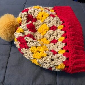 Red and Yellow Knitted Hat with Textured Design